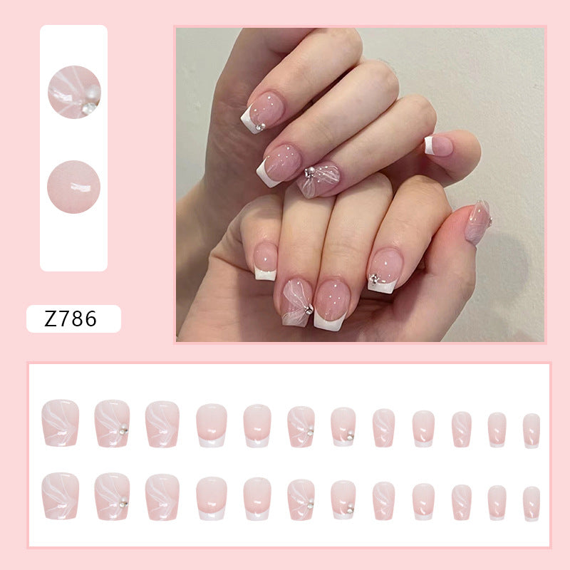 TN58 - French Tip Butterfly Bow Rhinestone Press-On Nails | 24 Pcs